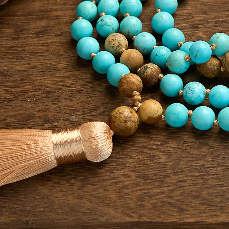 Pulsera de equilibrio con borlas de cuentas de jaspe turquesa y 108 cuentas de mala de Buda