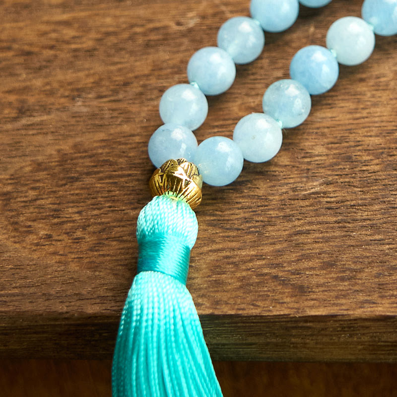 Pulsera de curación de loto con borla de aguamarina y 108 cuentas de mala de Buda