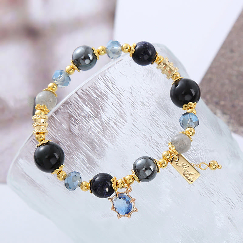 Pulsera de piedra de Buda con obsidiana negra natural, hematita y arenisca azul.