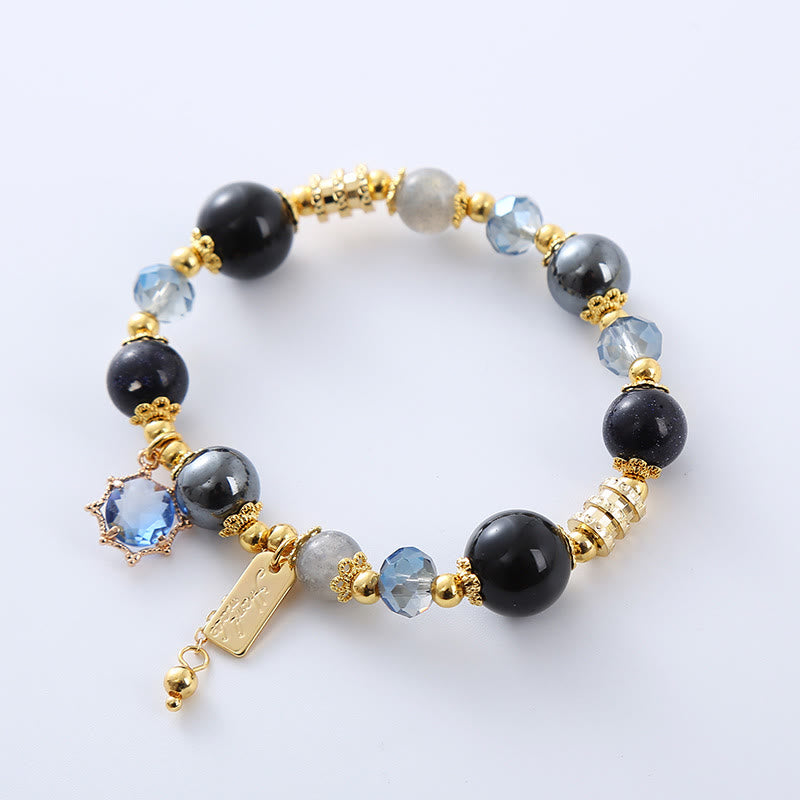 Pulsera de piedra de Buda con obsidiana negra natural, hematita y arenisca azul.