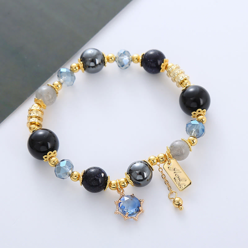Pulsera de piedra de Buda con obsidiana negra natural, hematita y arenisca azul.