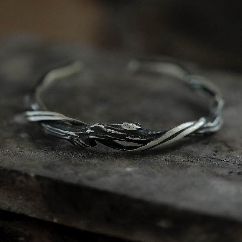 Brazalete de madera flotante con piedras de Buda en plata de ley 999