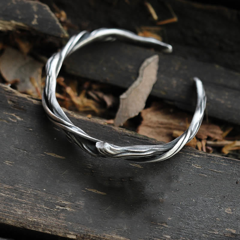 Brazalete de madera flotante con piedras de Buda en plata de ley 999