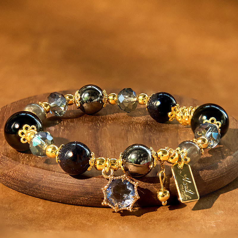 Pulsera de piedra de Buda con obsidiana negra natural, hematita y arenisca azul.