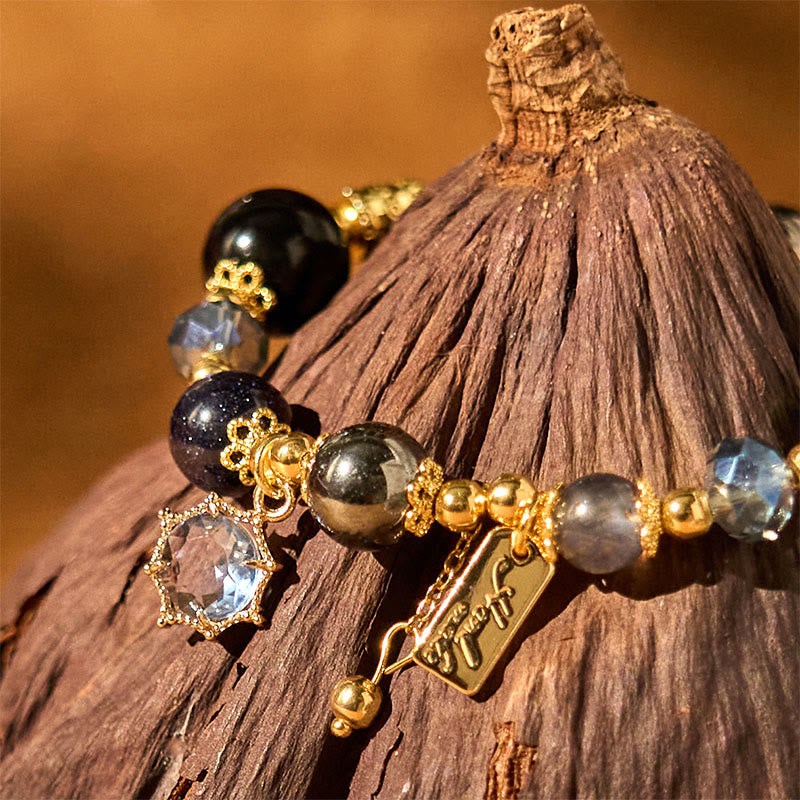 Pulsera de piedra de Buda con obsidiana negra natural, hematita y arenisca azul.
