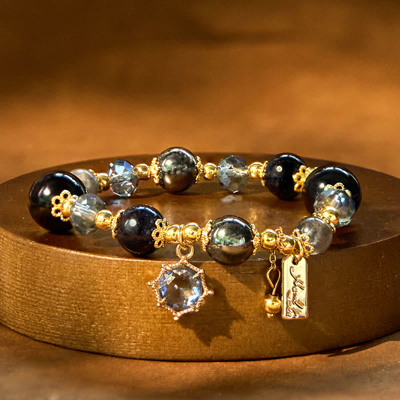 Pulsera de piedra de Buda con obsidiana negra natural, hematita y arenisca azul.