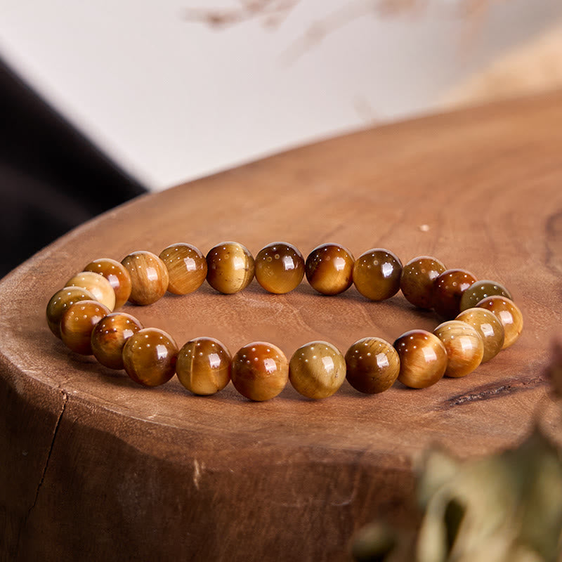 Pulsera de fuerza de ojo de tigre con piedras de Buda