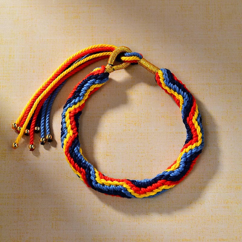 Pulsera de la suerte de cuerda de colores tejida a mano con piedras de Buda tibetanas