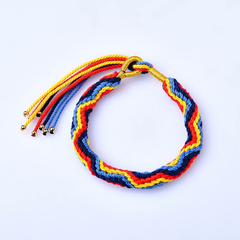 Pulsera de la suerte de cuerda de colores tejida a mano con piedras de Buda tibetanas