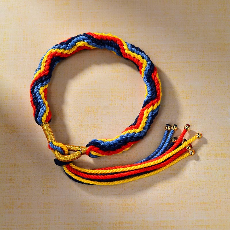 Pulsera de la suerte de cuerda de colores tejida a mano con piedras de Buda tibetanas