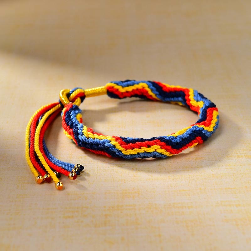 Pulsera de la suerte de cuerda de colores tejida a mano con piedras de Buda tibetanas