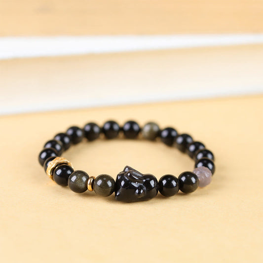 Pulsera protectora de conejo con piedras de Buda, obsidiana dorada, obsidiana negra y obsidiana plateada.