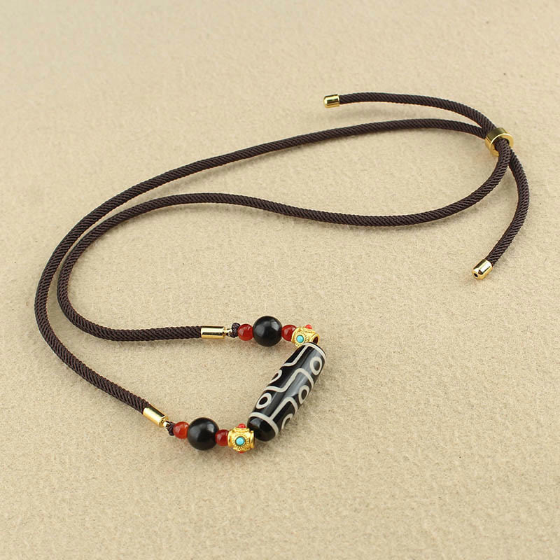 Collar con colgante de hilo con cuentas Dzi tibetanas de nueve ojos y piedras de Buda con bendiciones de protección