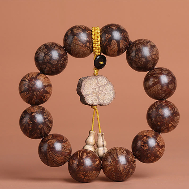 Pulsera de paz interior de madera de flor de ciruelo con piedras de Buda