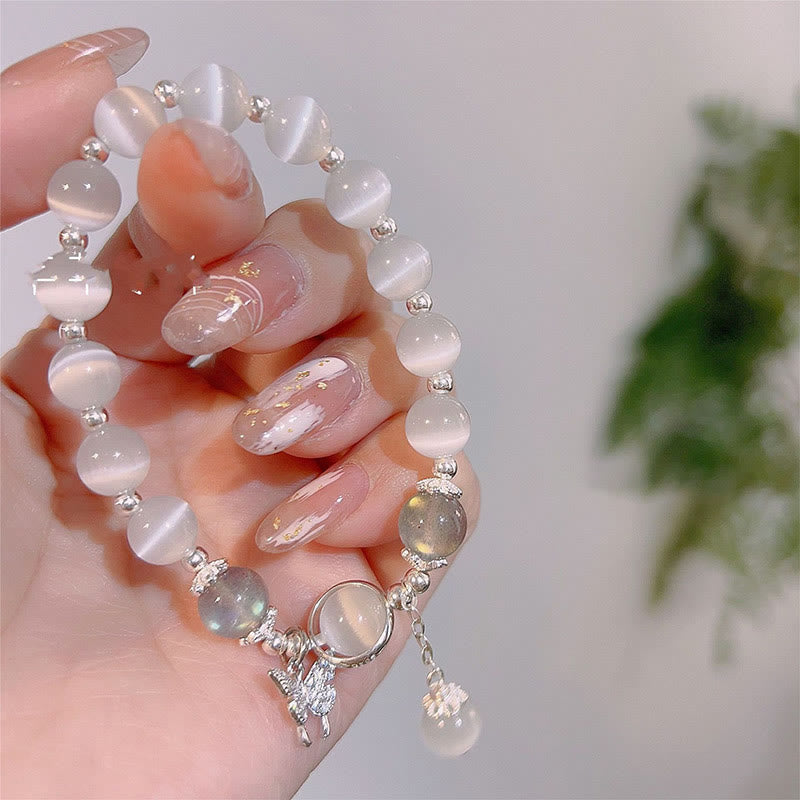 Pulsera de soporte con dije de estrella y mariposa con piedra lunar y ojo de gato de Buddha Stones