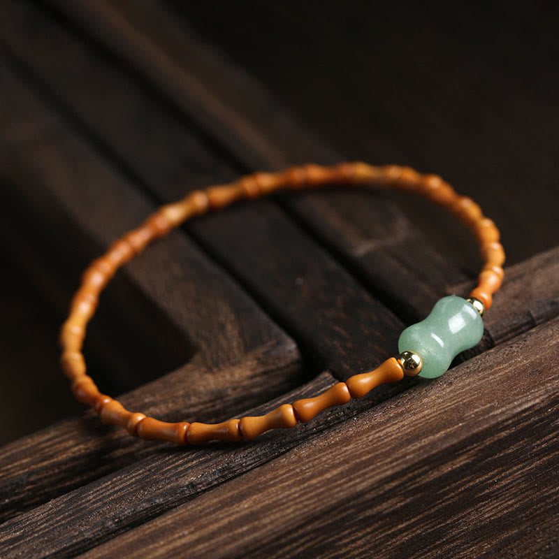 Pulsera de la suerte con diseño de bambú y aventurina verde hueso de oliva natural de Buddha Stones