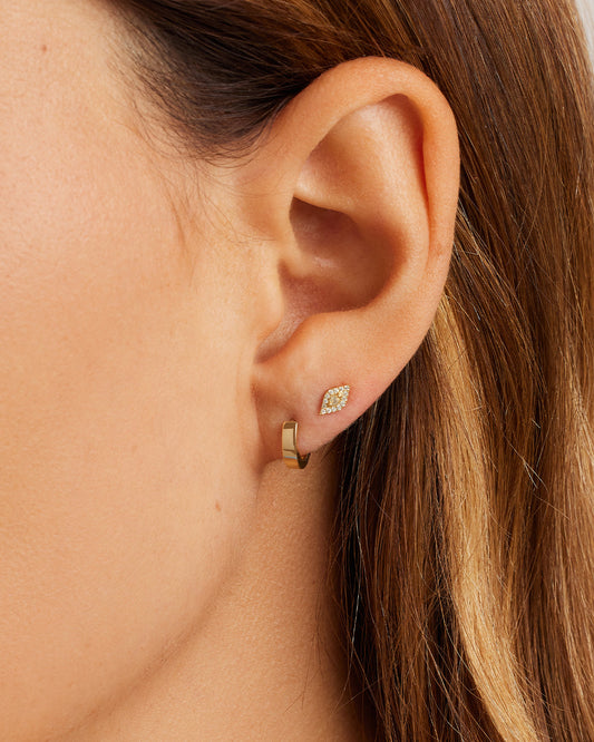 Aro Huggie individual rosa de oro de 14 quilates