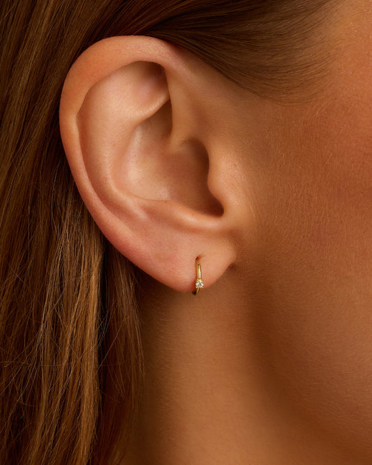 Huggies de solitario de diamantes