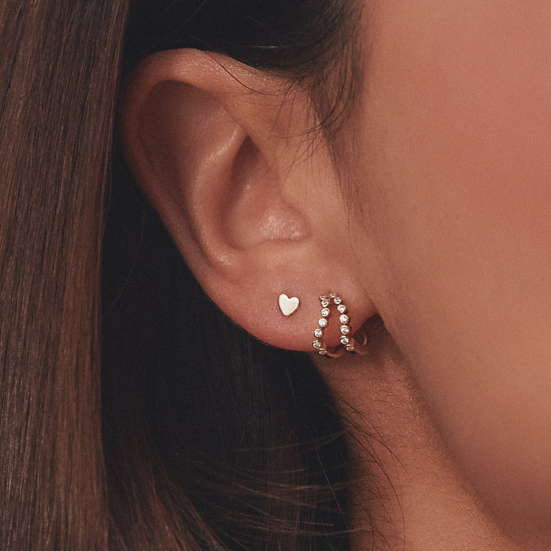 Pendientes de aro Huggie con ondas de oro y doble diamante