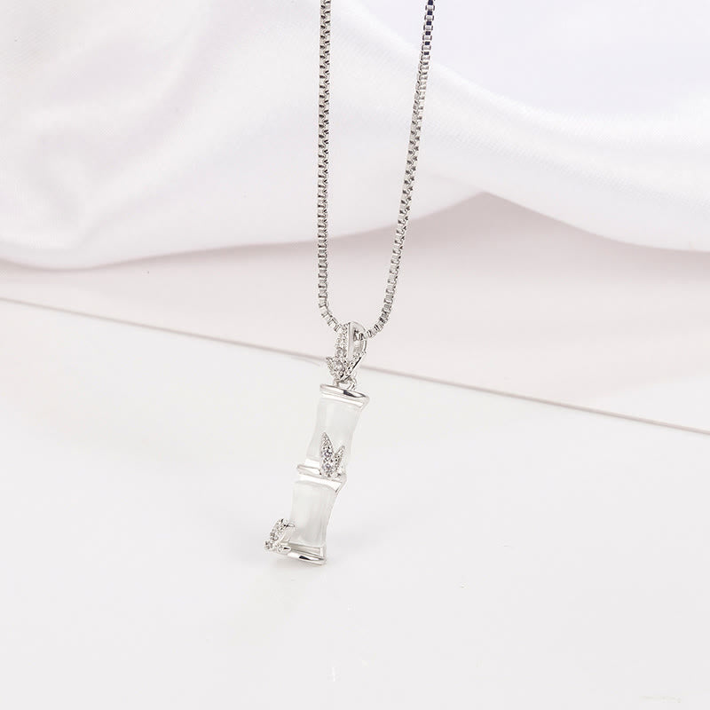 Collar con colgante de armonía con diseño de bambú y calcedonia de piedras de Buda