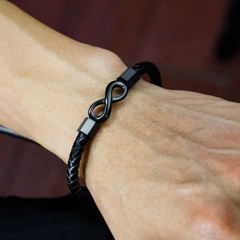 Pulsera de equilibrio con nudo infinito de piedras de Buda, acero de titanio y cuero trenzado.