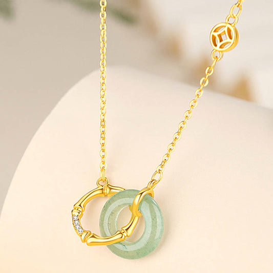 Collar con colgante de plata de ley 925 con aventurina verde natural, moneda de bambú y hebilla de la paz.