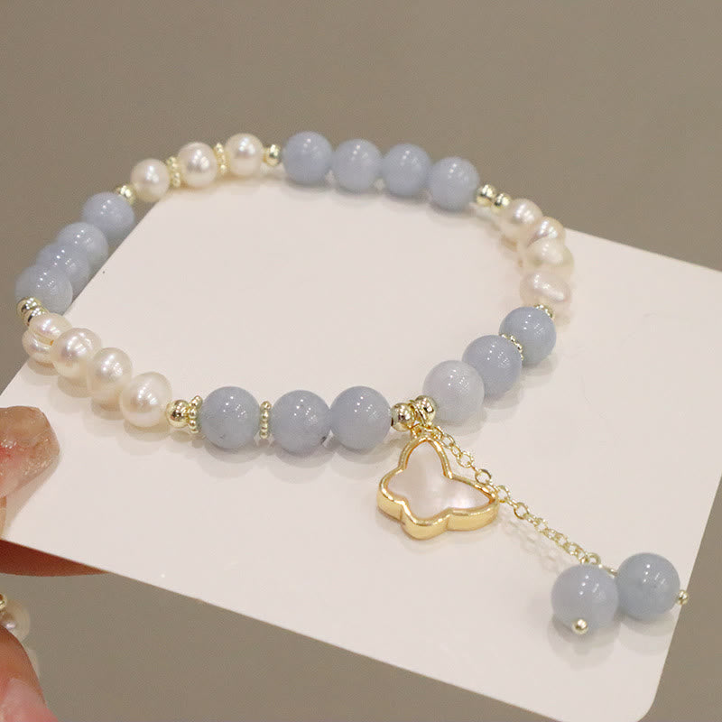 Pulsera con dije de mariposa, hoja de ginkgo y perla de aguamarina natural de Buda