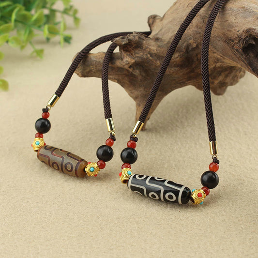 Collar con colgante de hilo con cuentas Dzi tibetanas de nueve ojos y piedras de Buda con bendiciones de protección