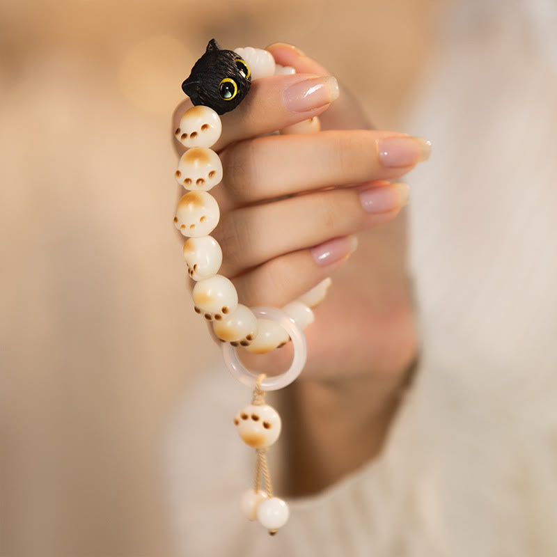 Pulsera de la paz con semillas de bodhi naturales de Buda, sándalo rojo, gato de la suerte y pata encantadora