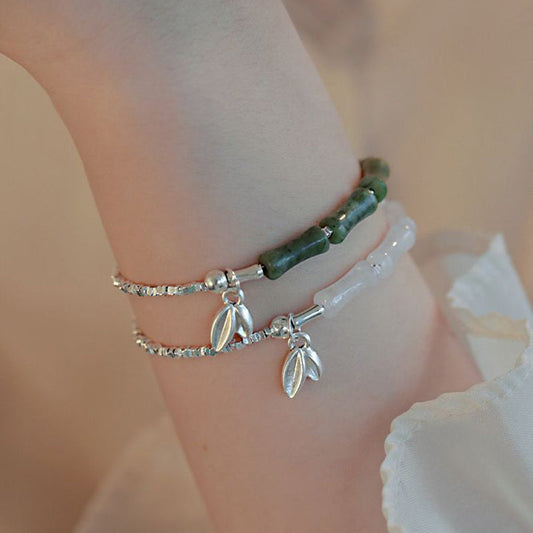 Pulsera de la suerte con diseño de peridoto y bambú en plata de ley 925 con piedras de Buda