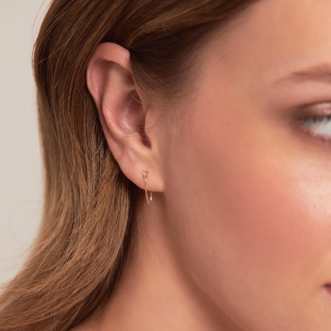 Pendientes de cadena con diamantes dorados