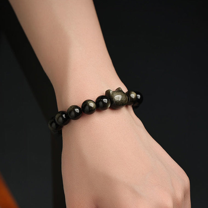 Pulsera de protección con piedras de Buda, obsidiana dorada y obsidiana plateada con brillo, con forma de pata de gato de la suerte.