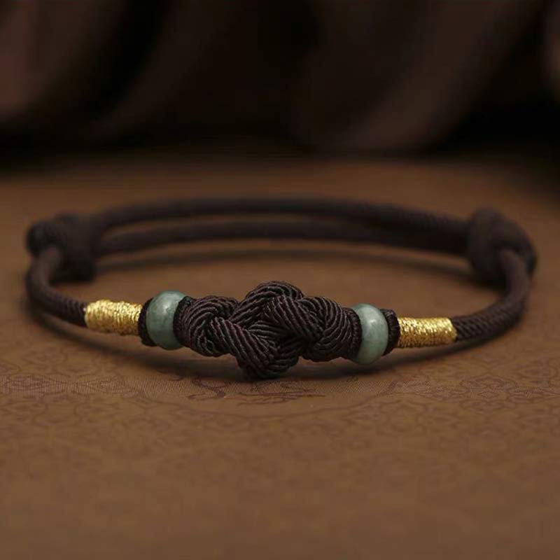 Pulsera trenzada con nudo de la fortuna y jade rojo de Buda