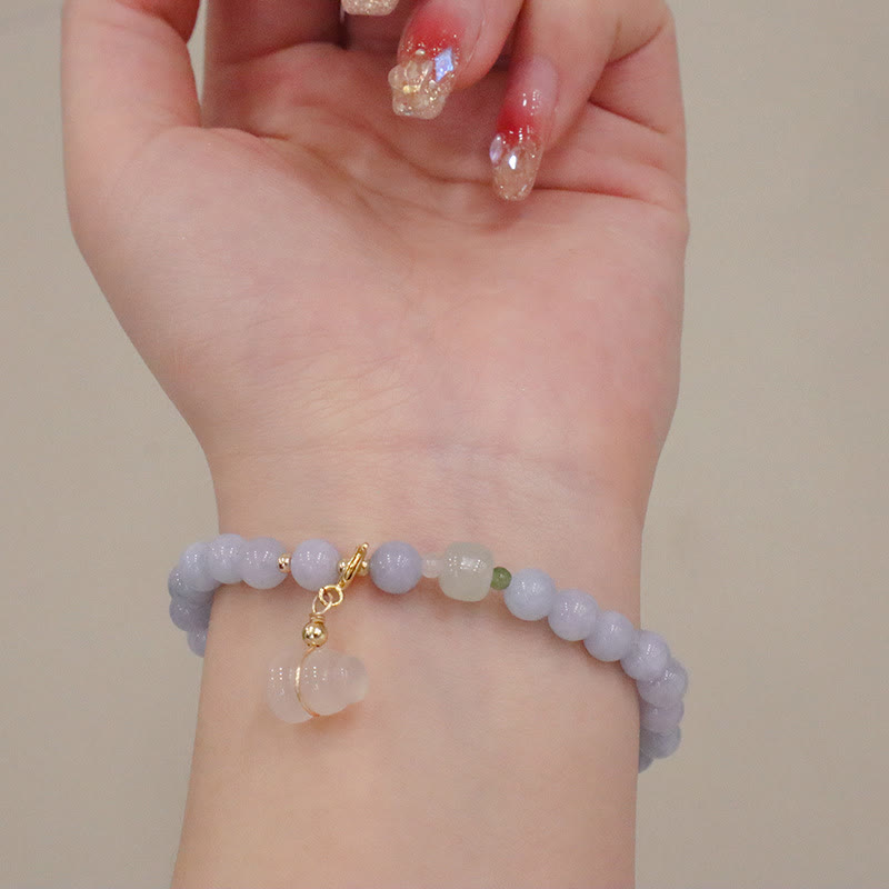 Pulsera con dije de gato, calabaza, conejo y calcedonia natural de aguamarina y piedras de Buda