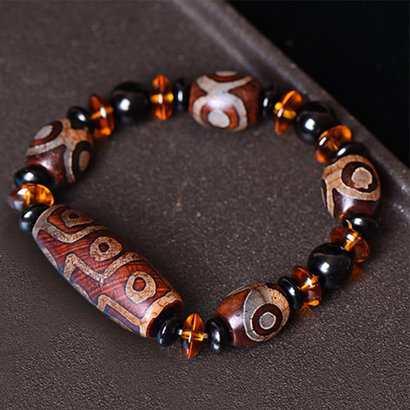 Pulsera tibetana retro de cuentas Dzi de nueve ojos con bendiciones de piedras de Buda