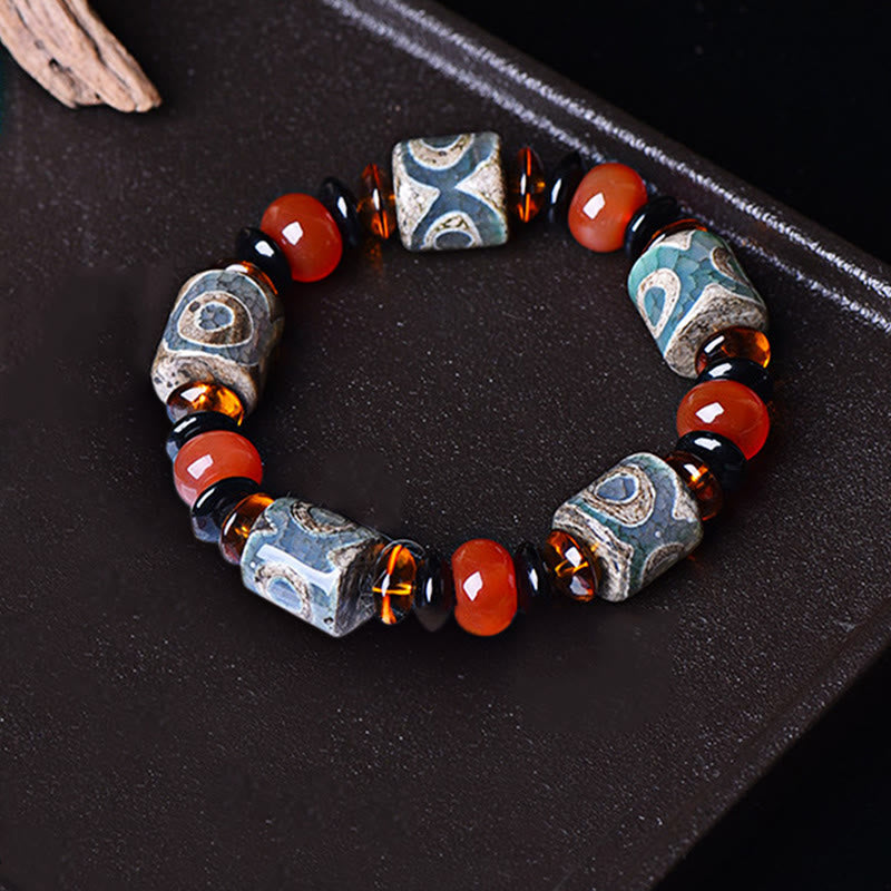 Pulsera tibetana de cuentas Dzi de tres ojos con piedras de Buda y ágata para la protección y la felicidad
