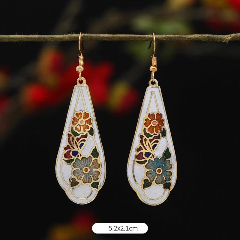 Pendientes colgantes de cobre con diseño de flor de loto y mariposa de Buda y piedras de iluminación