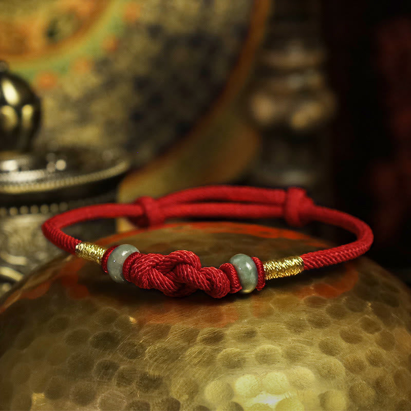 Pulsera trenzada con nudo de la fortuna y jade rojo de Buda