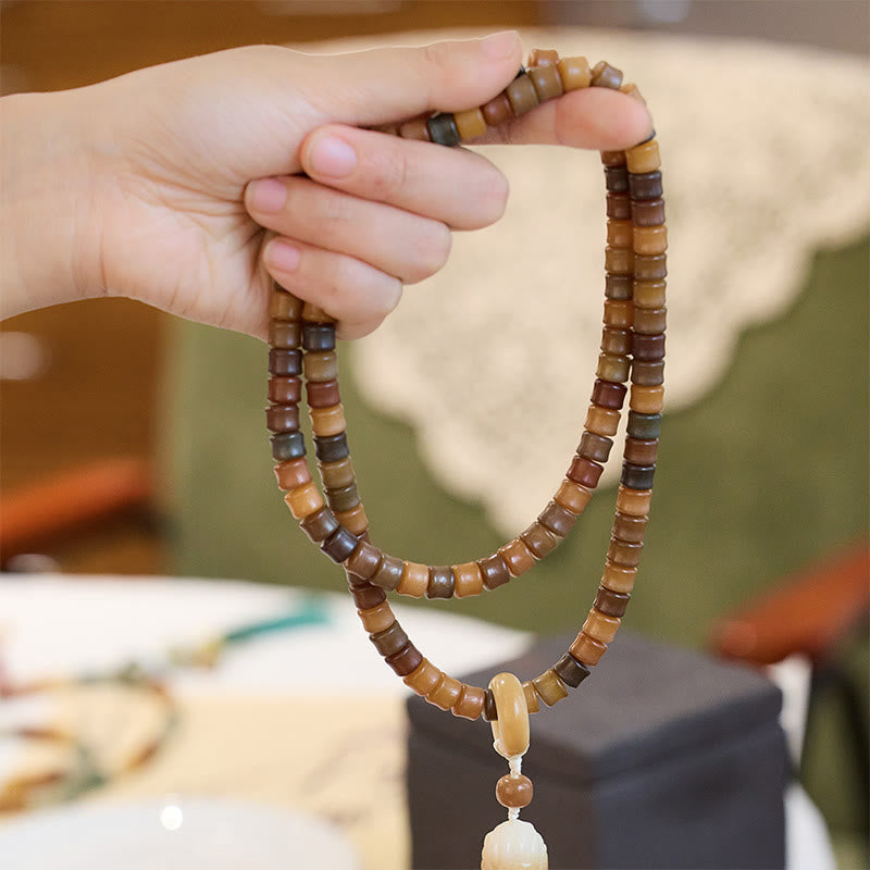 Pulsera de armonía con 108 cuentas de mala, semillas de Bodhi y mano de Buda grabada con loto