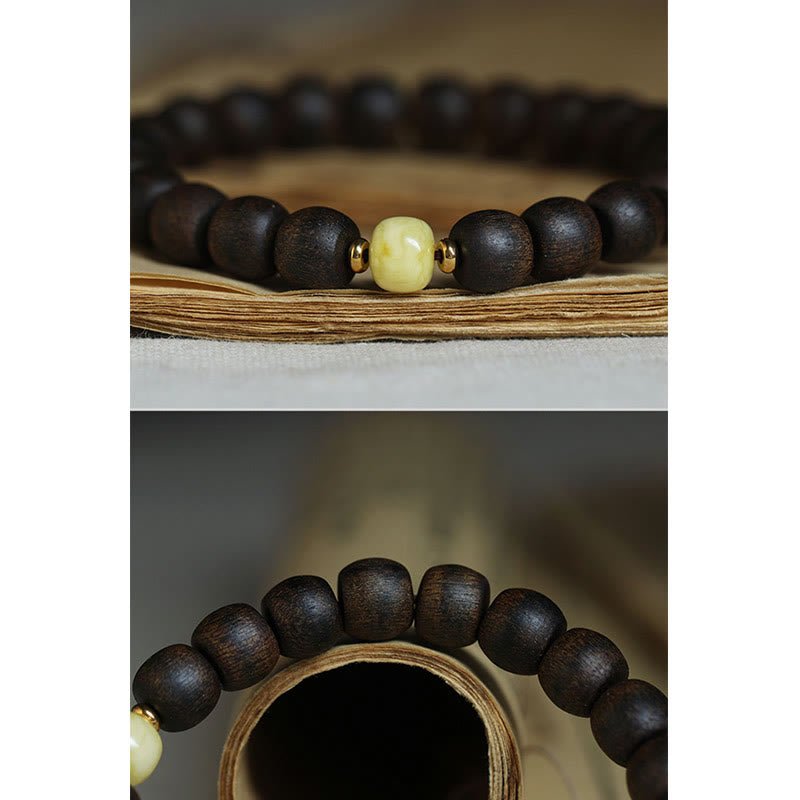 Buddha Stones Seltenes Brunei-Adlerholz-Bernstein-Armband mit Balance, Frieden und Ruhe