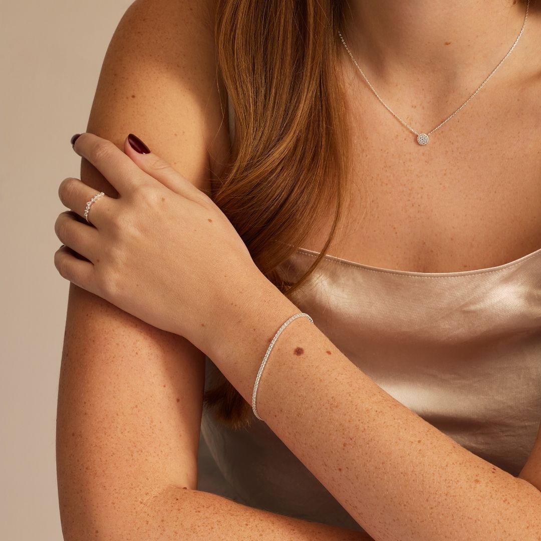 Silbernes Tennisarmband und Ohrstecker im Princess-Diamant-Stil