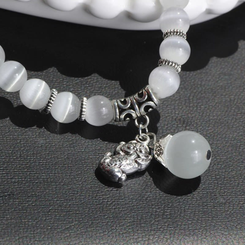 Pulsera triple vuelta con soporte PiXiu de ojo de gato y piedras de Buda