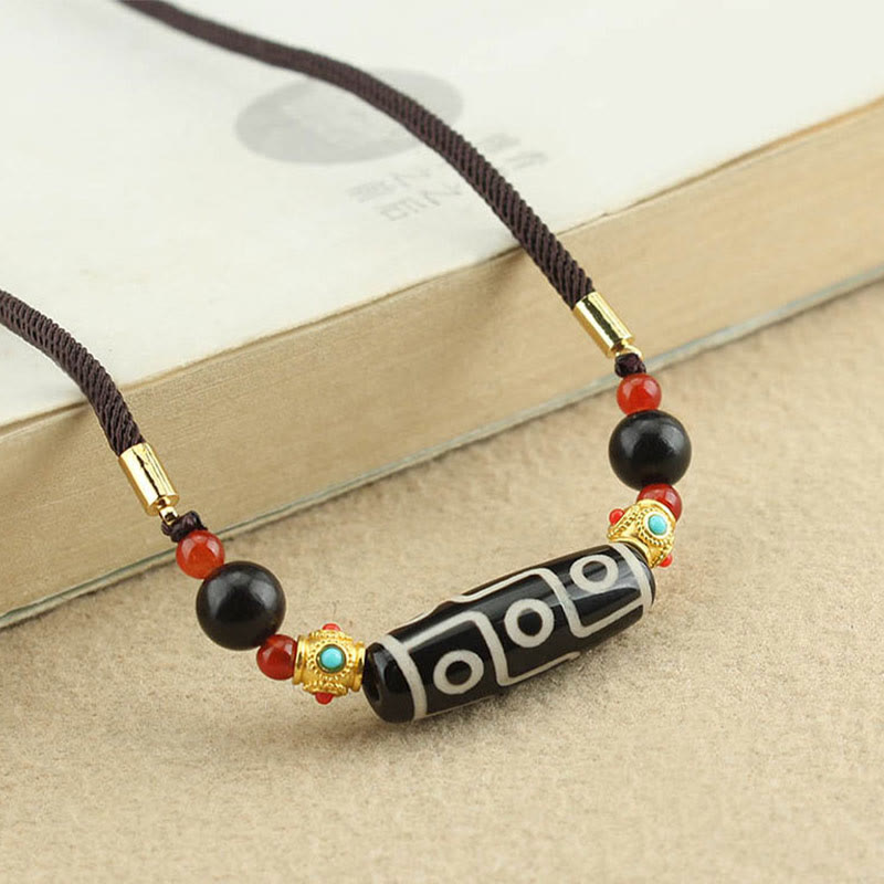 Collar con colgante de hilo con cuentas Dzi tibetanas de nueve ojos y piedras de Buda con bendiciones de protección