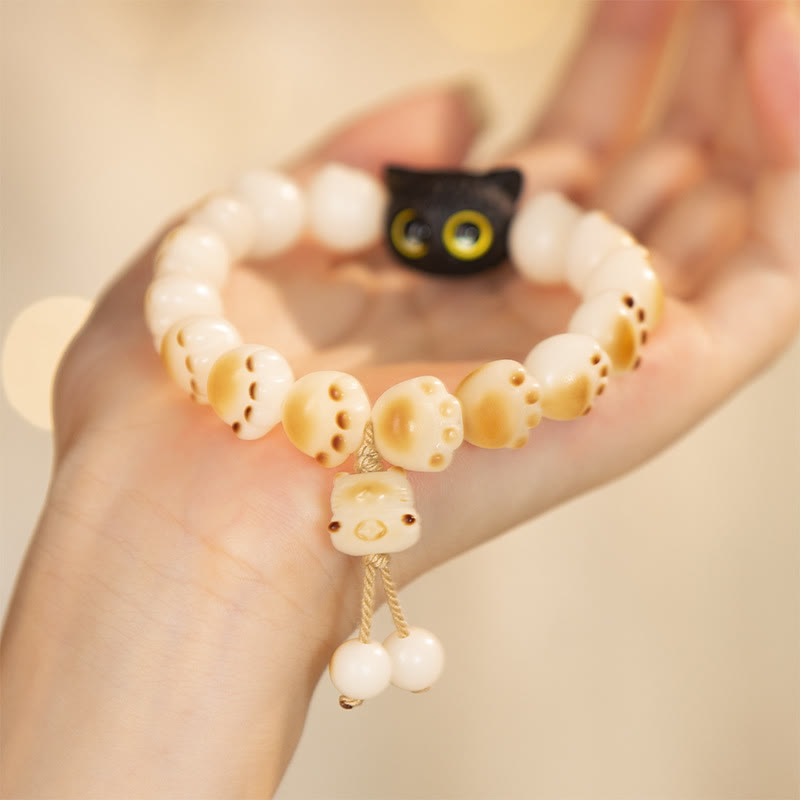 Pulsera de la paz con semillas de bodhi naturales de Buda, sándalo rojo, gato de la suerte y pata encantadora