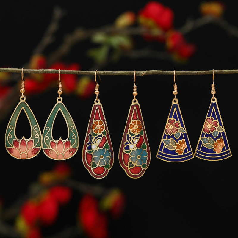 Pendientes colgantes de cobre con diseño de flor de loto y mariposa de Buda y piedras de iluminación