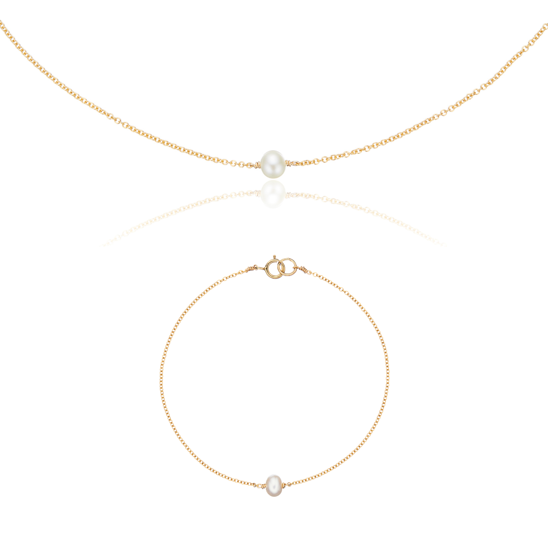 Geschenkset mit goldener Halskette und Armband mit einer Perle