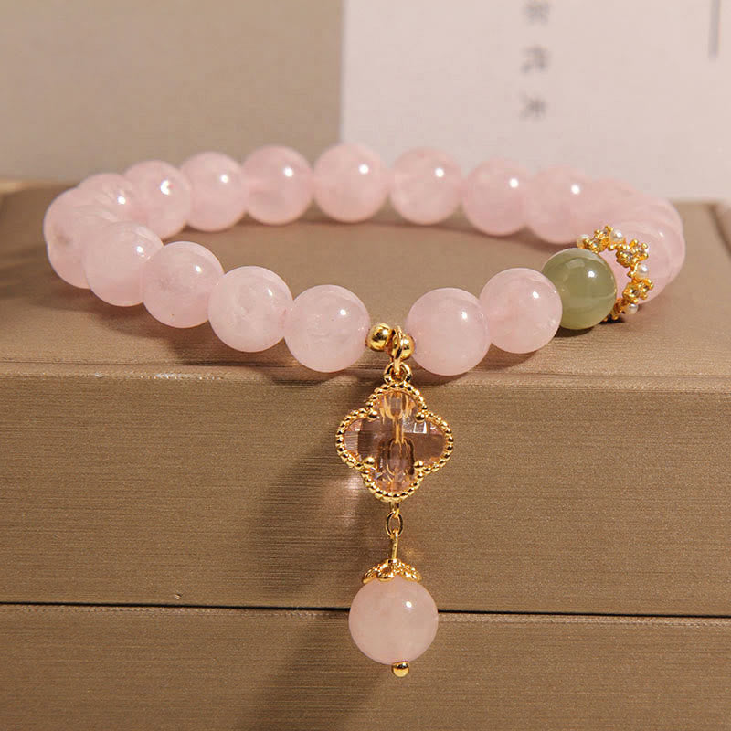 Pulsera relajante de trébol de cuatro hojas de cristal rosa natural de Buddha Stones