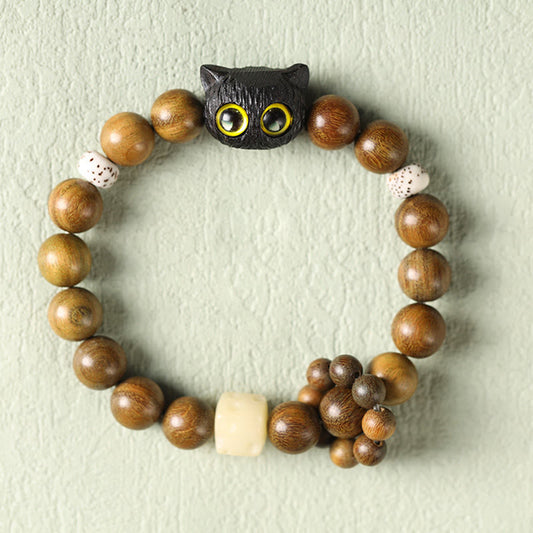 Pulsera relajante de paz con gato de madera de ébano y sándalo verde de Buddha Stones