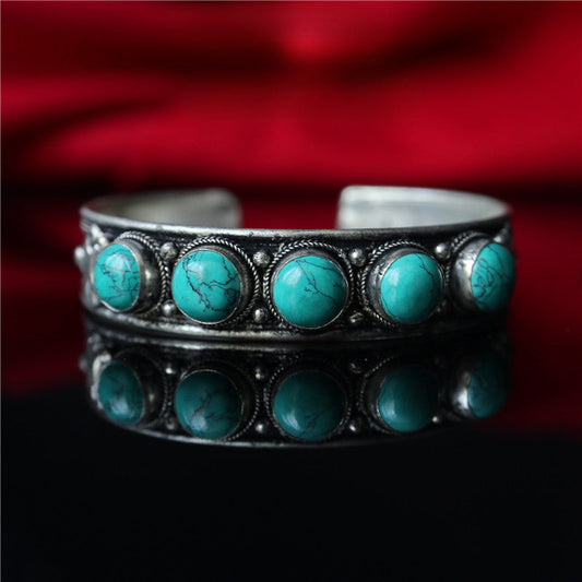 Nepalesischer handgefertigter Armreif mit Türkiseinlage