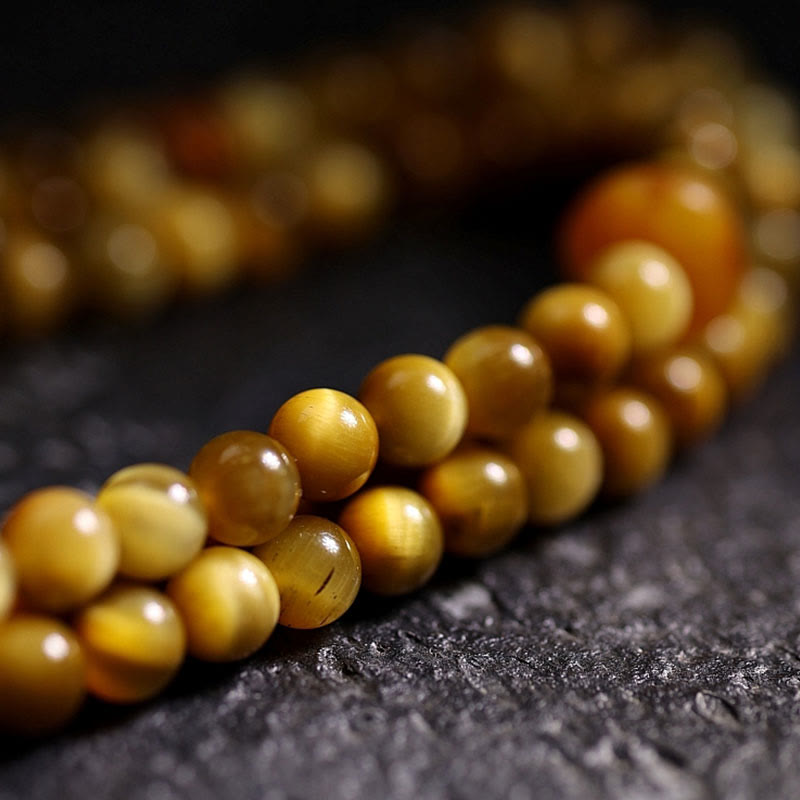 Buddha Stones 108 Mala-Perlen, natürliches Tigerauge, Kupfer, Dorje-Schutz, Quastenarmband